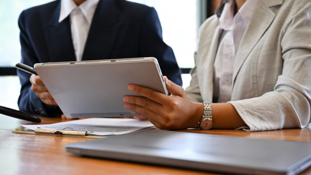 A personal injury attorney is working with their client.