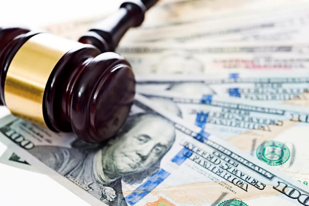 gavel with cash