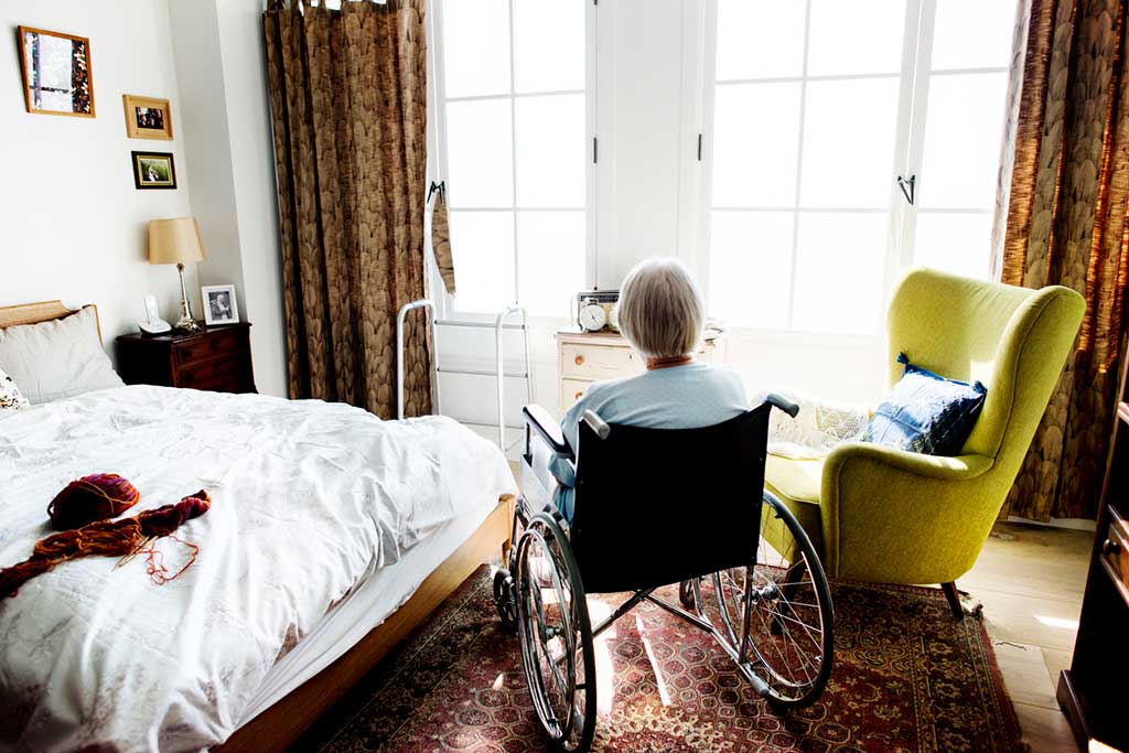 Nursing home resident in room