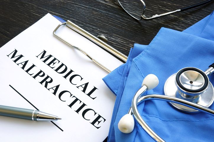 medical malpractice claim forms and stethoscope