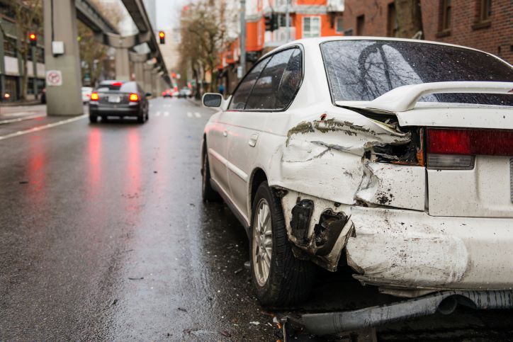 Hit & run car accident involving a white sedan