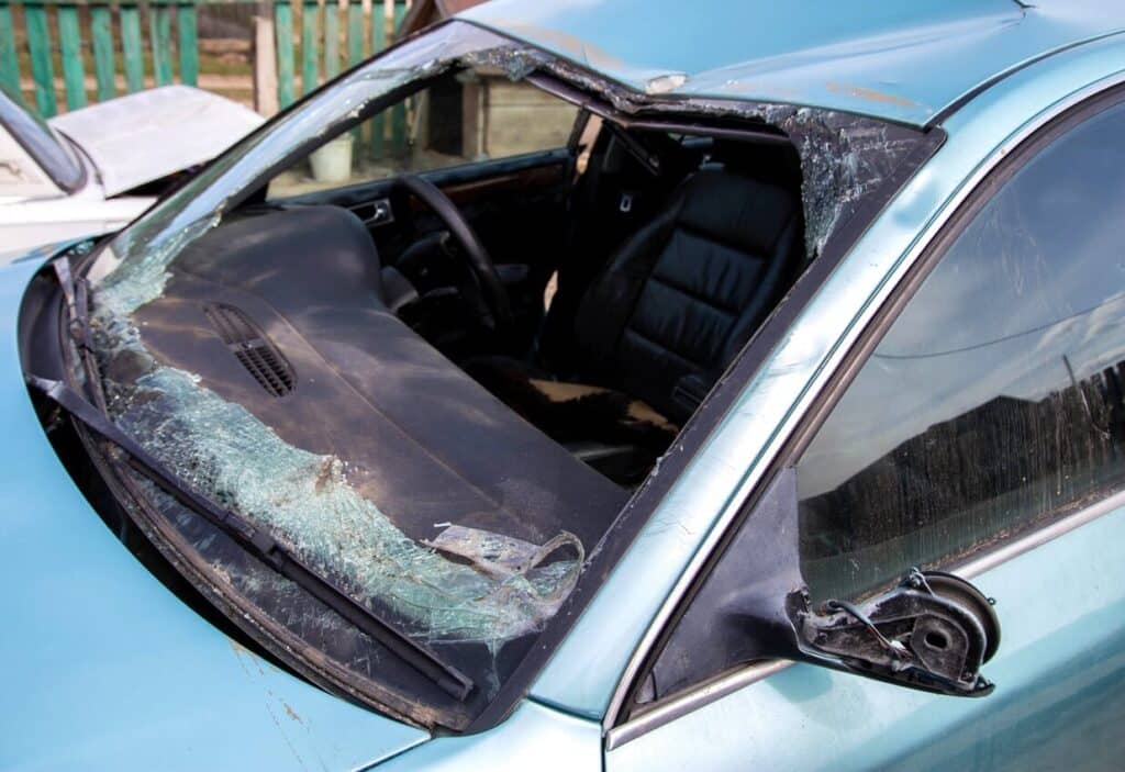 A car after a collision with pedestrians and an accident. Damage to the car body and roof. Emergency state, close-up