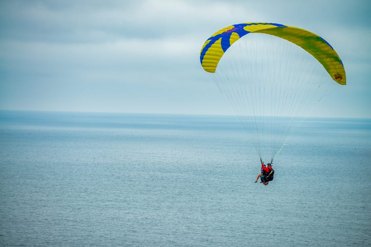 A parasailer over the water.