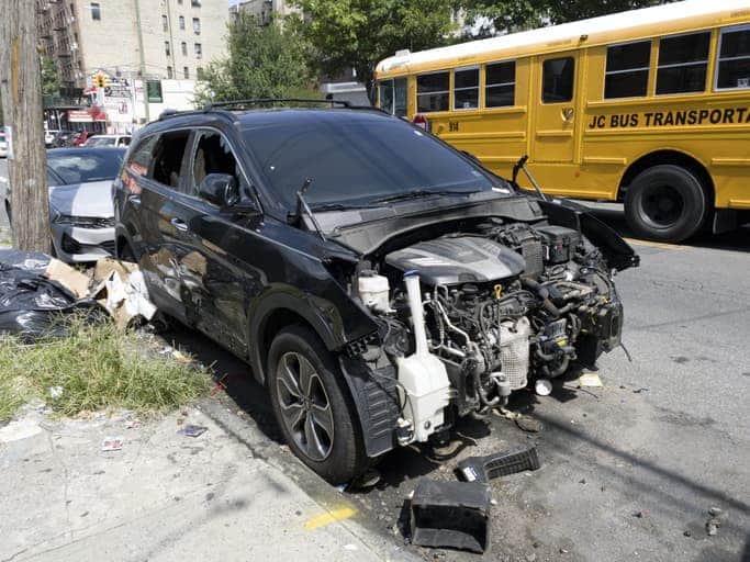 Black car involved in car accident