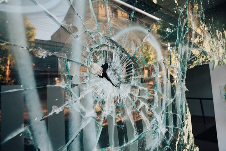 A broken business shop window.