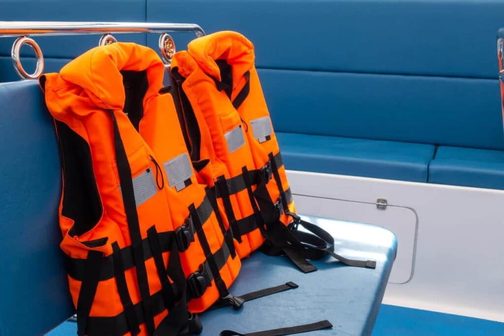 Life jackets sitting in an empty boat