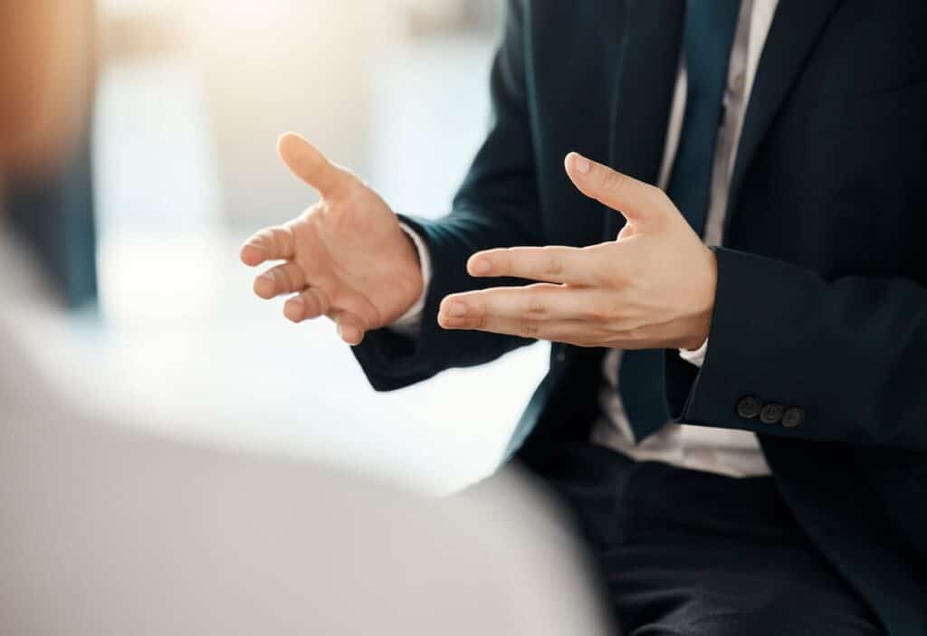 A product liability lawyer talking with their client.
