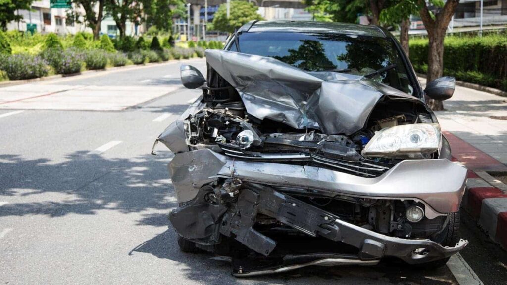 A car with serious damage from a car accident
