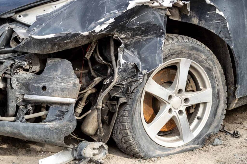 An Uber car that has been damaged in an accident