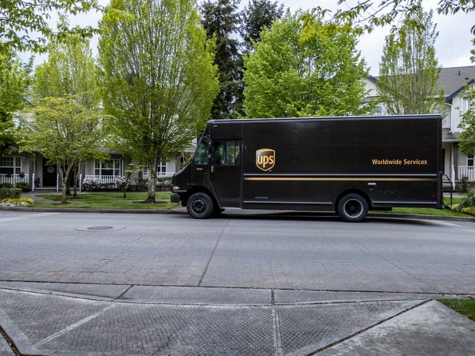 A photo of a UPS truck parked in the street.