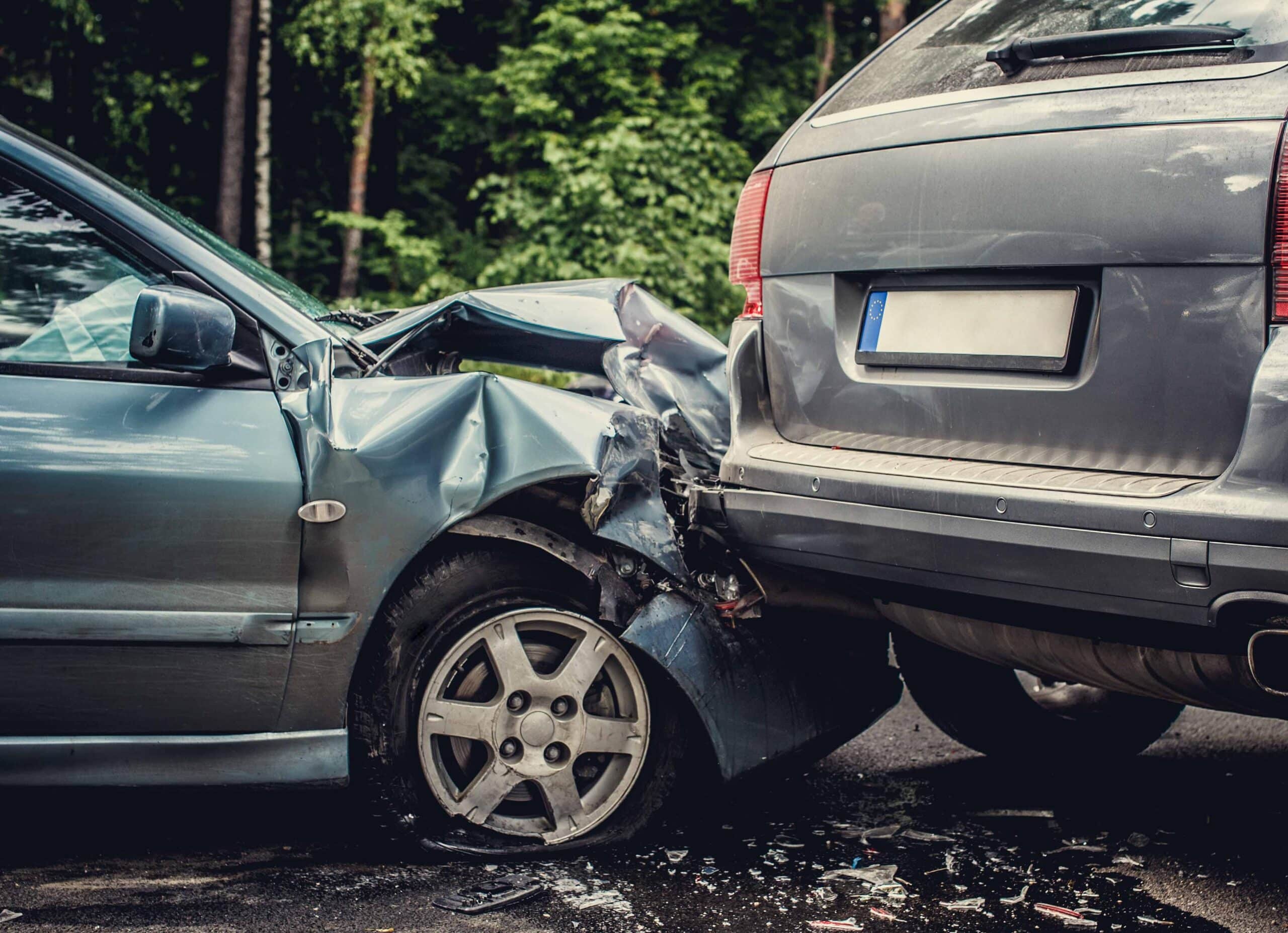 Crashed rental car involved in rear-end accident on the road