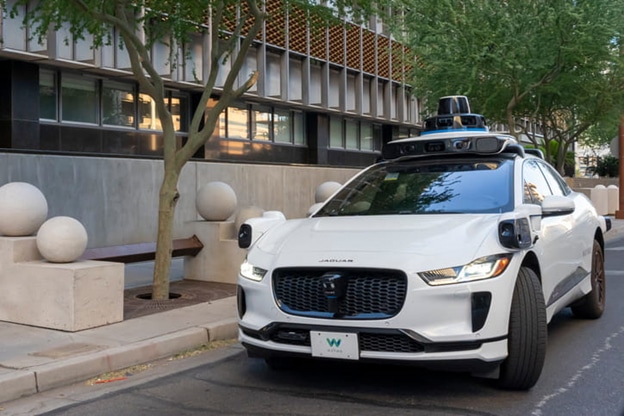 Can You Sue Uber Or Lyft If You’re Injured In A Self-Driving Vehicle Accident In Florida? 1 Self-Driving Uber Or Lyft Vehicle Parked On A Street, Representing An Autonomous Vehicle Accident In Florida.
